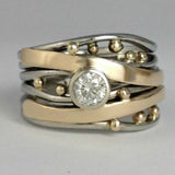 Exclusive ring of gold and silver zirconia