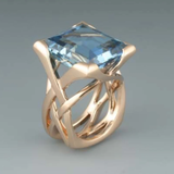 Vintage rose gold ring with blue zircon
